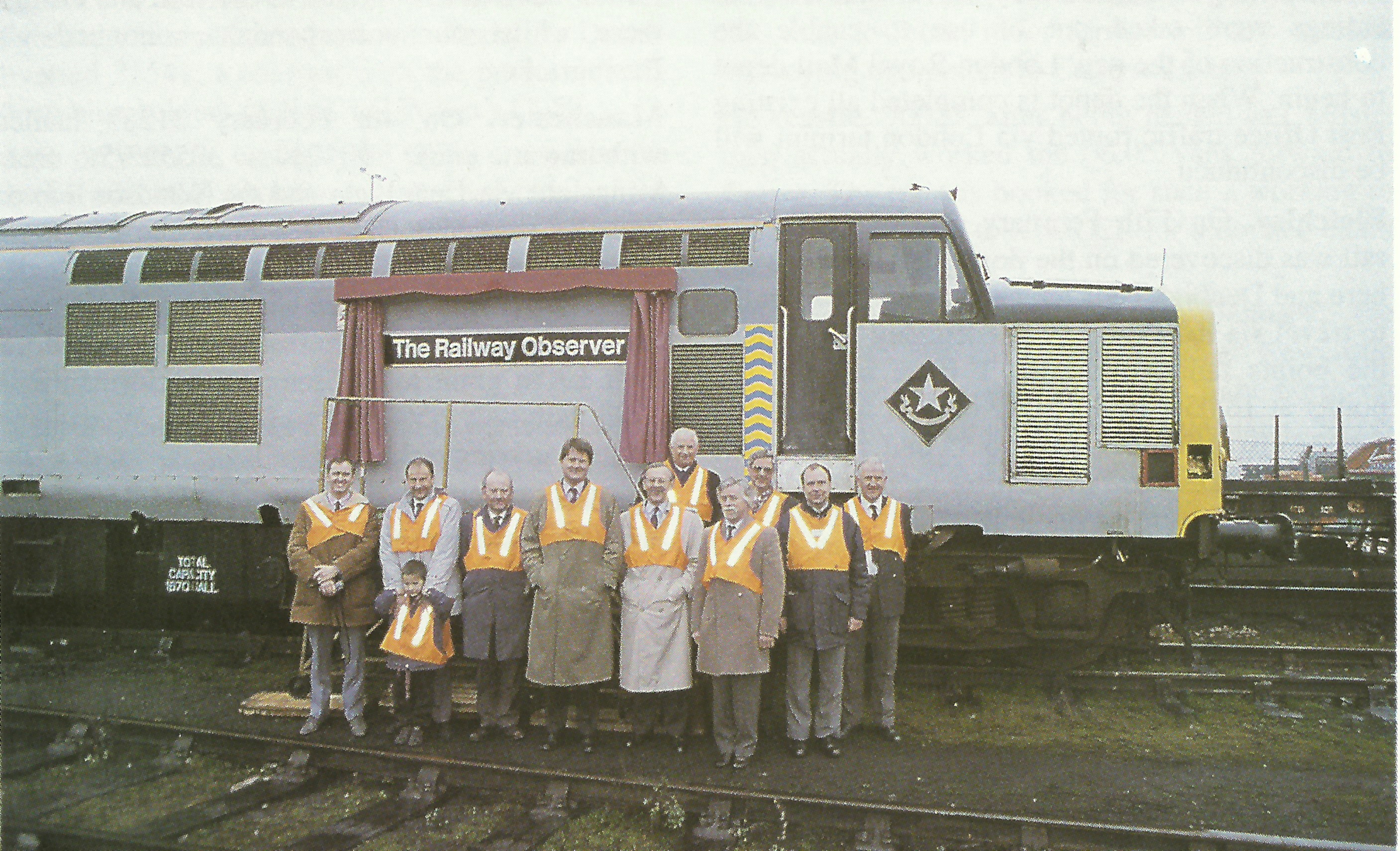 Members of the Management Committee and Society Officers stand in front of 37890 after unveiling the nameplate on 23rd February 1994. Brian Morrison

Left to Right
Reg Wood, David and Andrew Bird, Terry Silcock, John Redgate, Rodney Lissenden, John Sweet, Peter Davies, David Cole, Steve Ollive and Hugh Gould.
Courtesy Gordon Davies and John Redgate