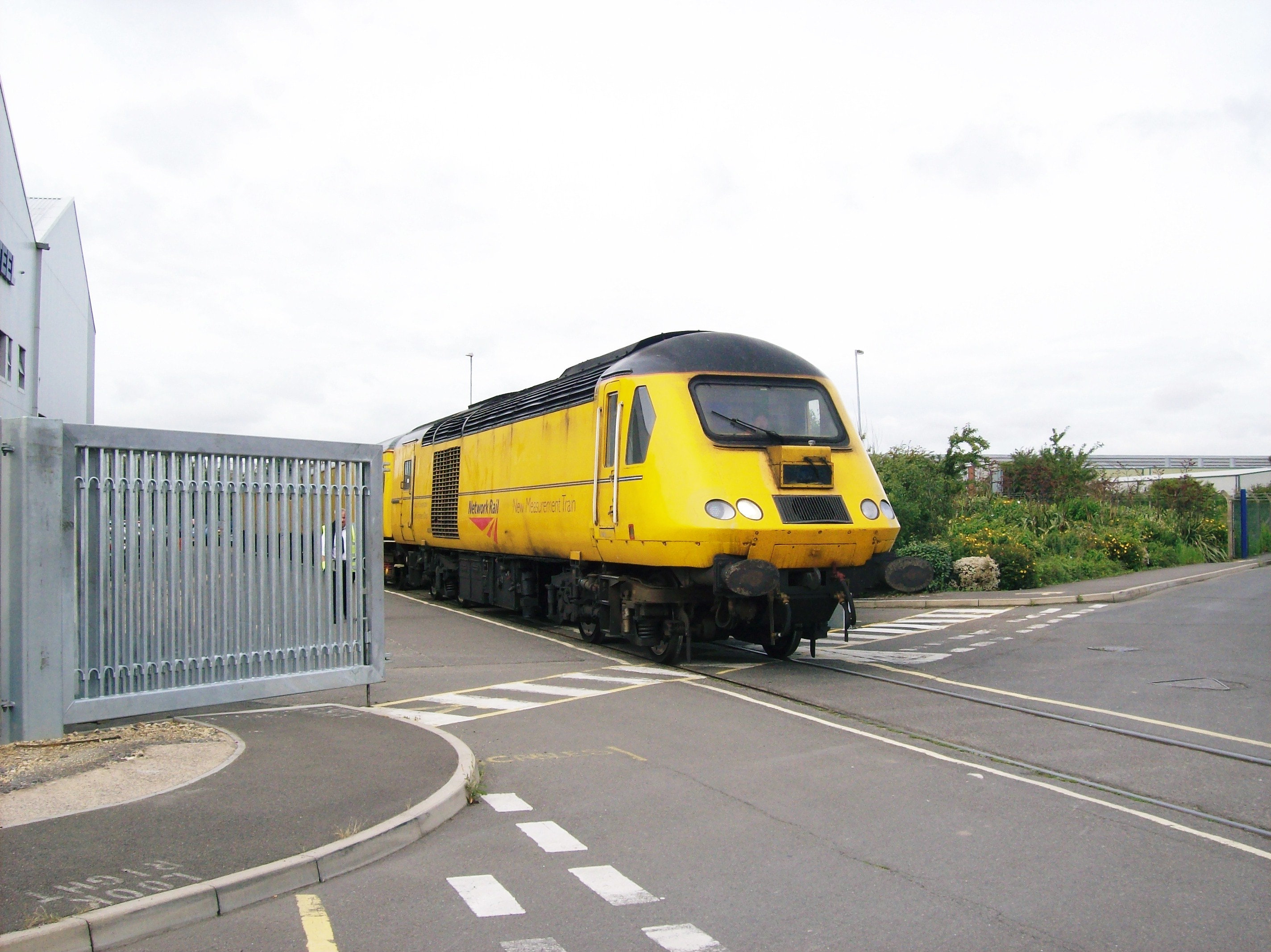 43014, in yellow livery with Network Rail New Measurement Train branding, arriving at Brush, Loughborough on 3rd August 2009 for re-engineering, which replaced its Paxman Valenta power unit with a MTU one; it departed from the works on 7th October. George Toms