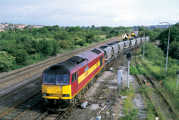 Following a derailment, 60001 came to the help cautiously pushing eight of the recovered MGR wagons into the disused Bennerley sidings (37375 and the Thornaby breakdown crane are in the background), 23rd June 2002. Dave Peachey
60049 and the Toton re-railing train were also used for this recovery.