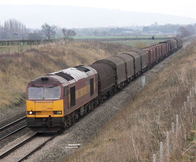 60001 passing Besford with 10.30 Llanwern to Round Oak steel coil in covered wagons, 28th February 2005. Dave Padgett