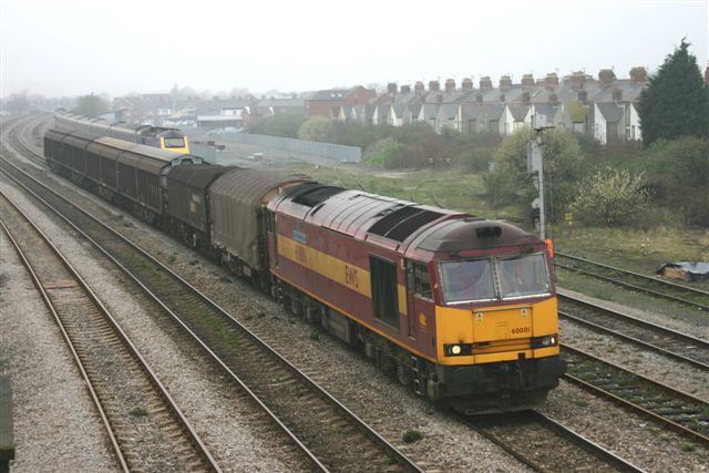 60001 passing Cardiff Canton at 10.30 with 6B03 Margam to Newport ADJ yard Enterprise which started as 6B29 Trostre to Margam steel coil empties, 31st March 2005. Tony Allen
The driver at the phone is the HST driver asking for the route to Cardiff Central to form the 10.50 to Paddington.
