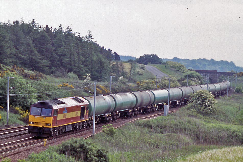 60001 at Craigenhill with 6S36 Dalston to Grangemouth empty bogie oil tanks, 13th June 2001. Peter Kellett