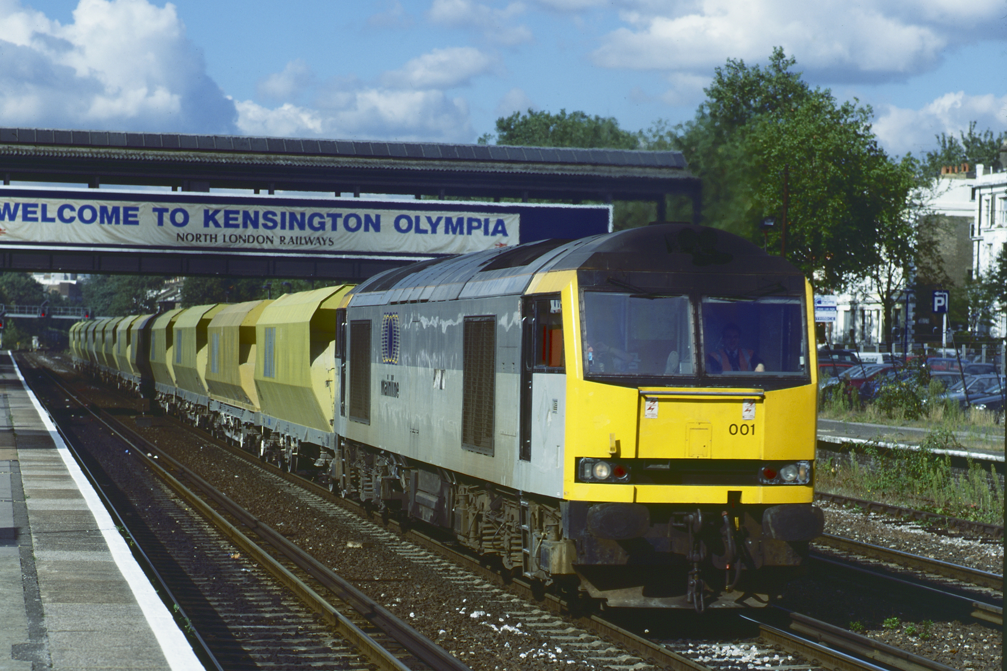 60001 passing Kensington Olympia on 2nd October 1996 with the 12.00 Acton Yard to Angerstein Wharf. Rodney Lissenden