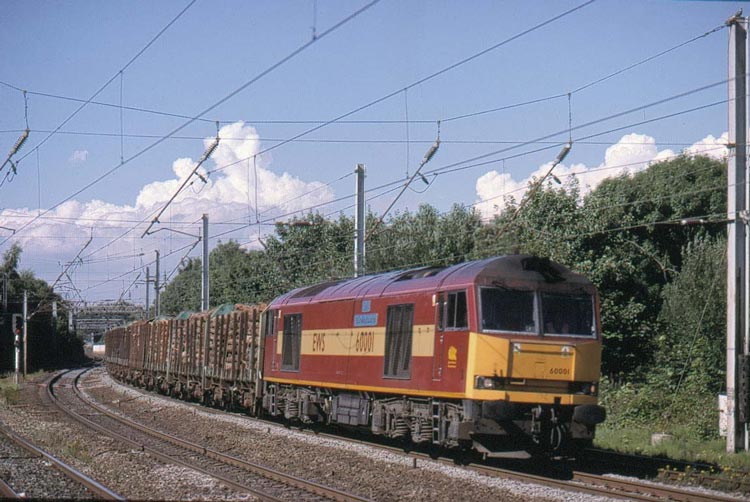 60001 hauls 6G33 Carlisle to Chirk loaded timber through Lancaster, 27th July 2001. Russell Moorhouse
60001 hauled this train as far as Warrington Arpley.