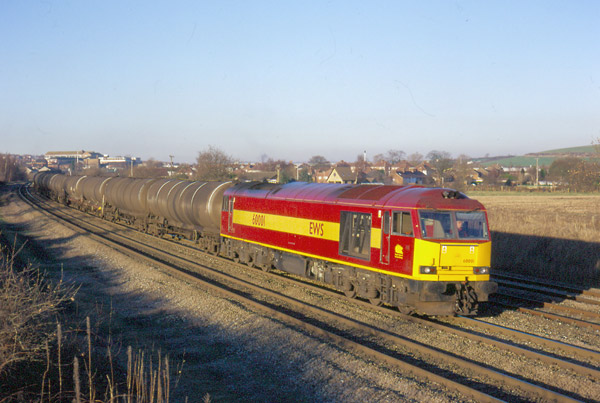 60001 near Langley Mill with 6M55 09.58 Lindsey to Rectory Junction loaded bogie oil tanks, 27th December 2000. Dave Peachey