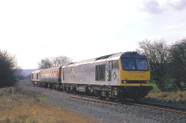 60001 leads Test Car 6 and 60011 near Upper Broughton, heading north on the Old Dalby test line, 3rd March 1990. Dave Peachey