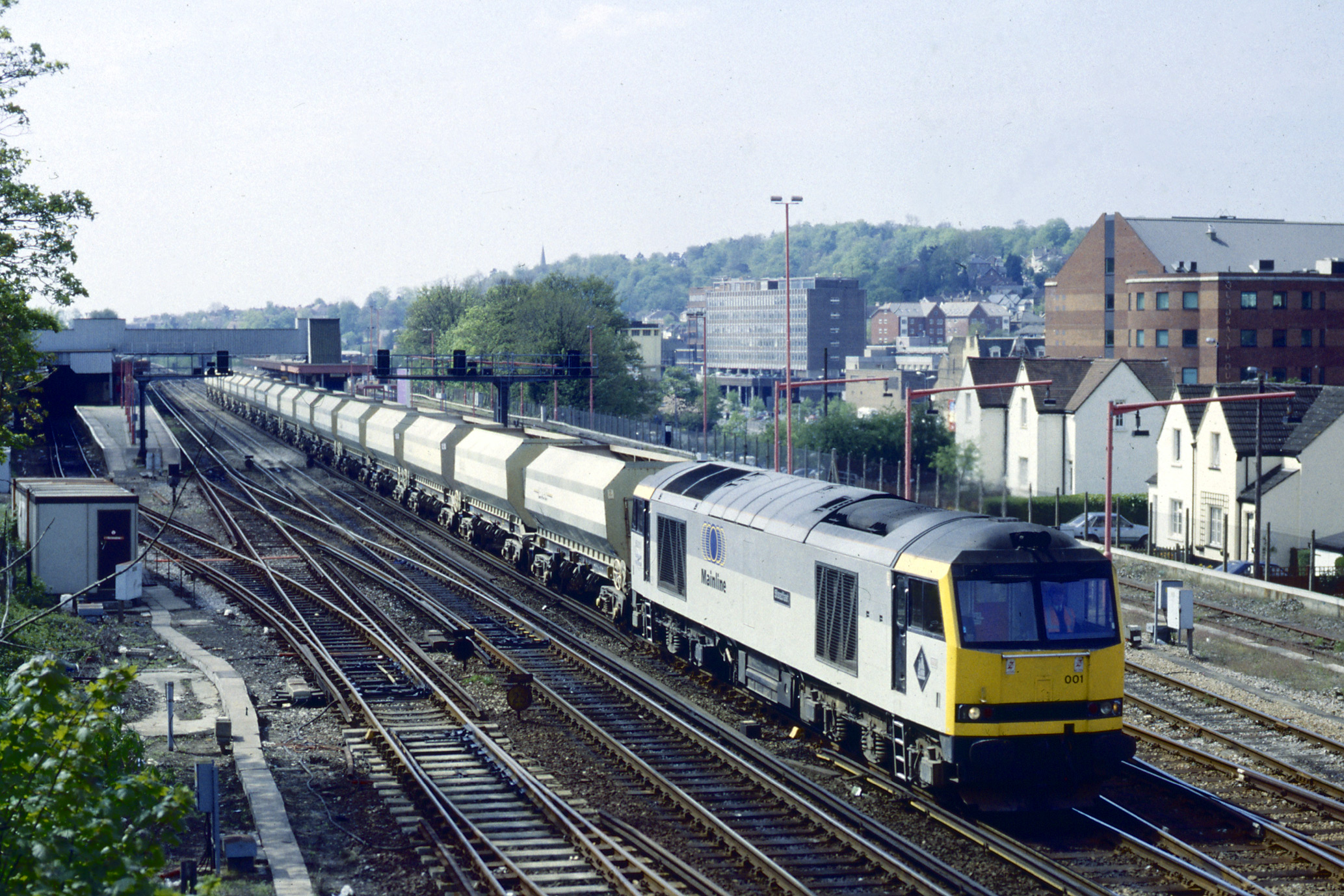 60001 Steadfast passing Redhill station with an up freight of empty Brett stone hopper bogies on 14th May 1996. Michael Mensing