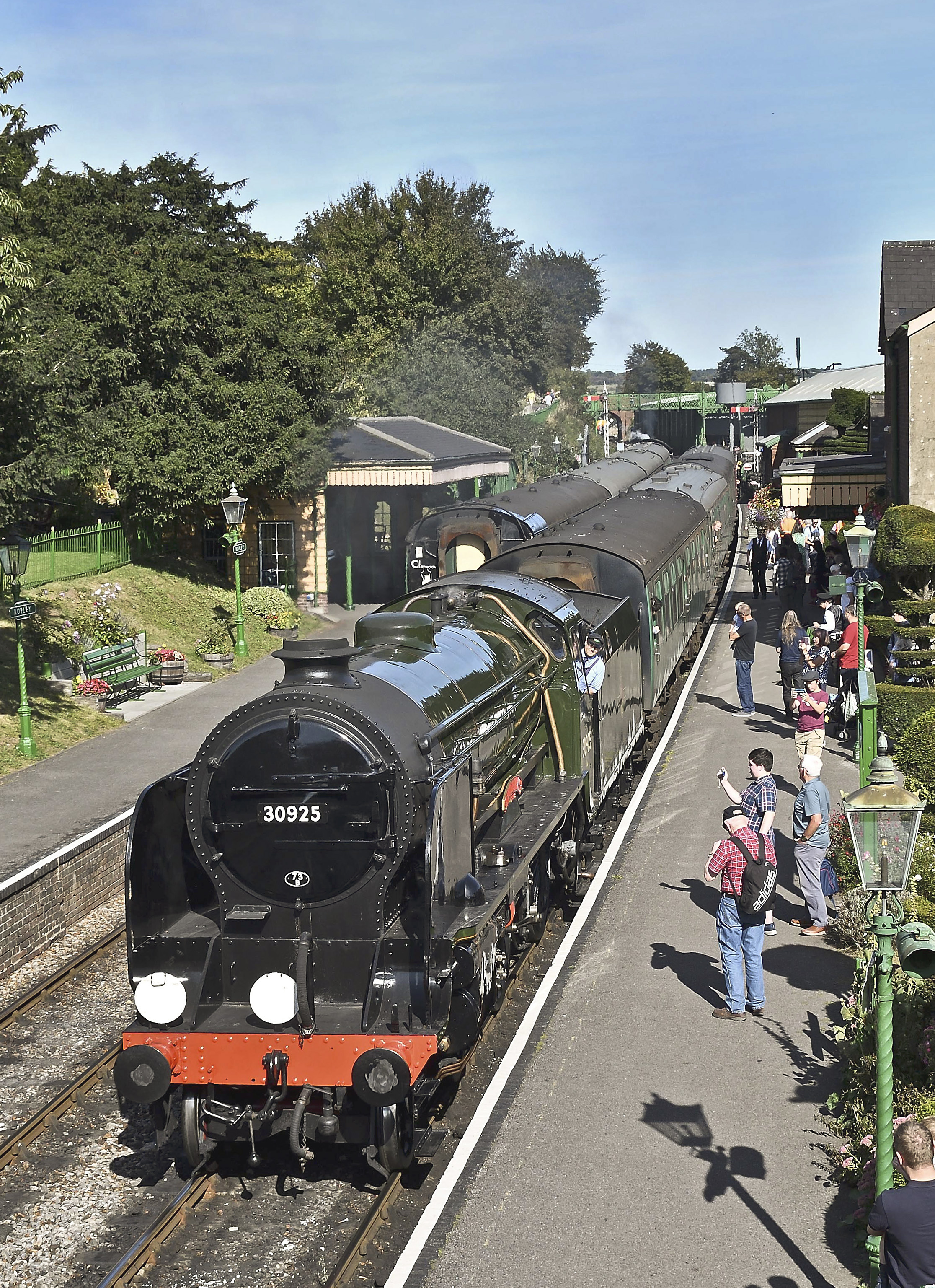 Ex-SR Schools class 30925 Cheltenham rolls into Ropley station with the 15.00 Medstead & Four Marks-Alresford train on 14th September 2019.  This was its first day in passenger service in BR lined green livery since 1962!  David Cox
This photo was on the back cover of November 2019 RO.